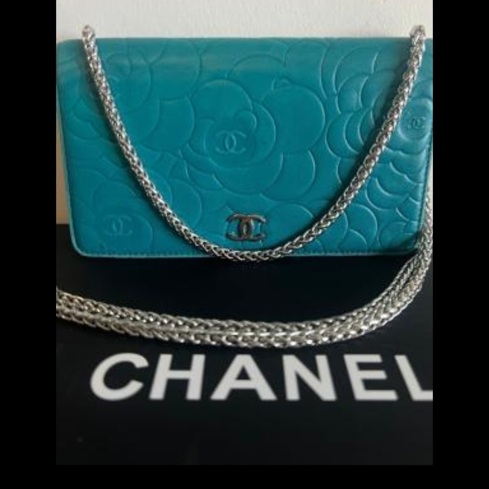CHANEL Turquoise Floral Embossed Clutch